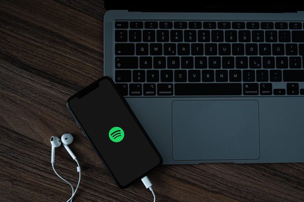 mobile phone, spotify, laptop, headphones, smartphone, cellphone, music service, music, social media, entertainment, podcast, macbook, technology, spotify, spotify, spotify, spotify, spotify